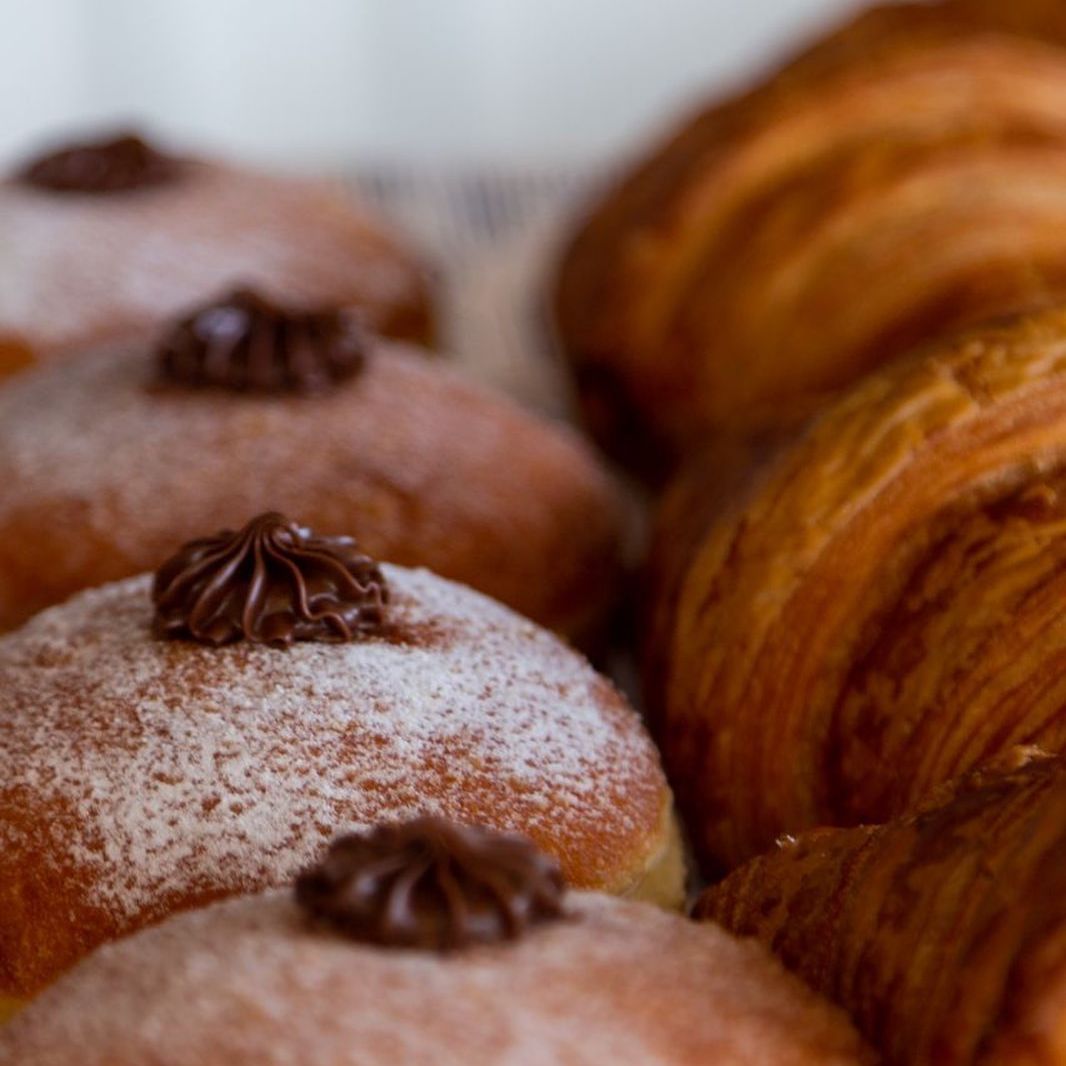 A tray of sweet pastries in Drip Cafe's cabinet