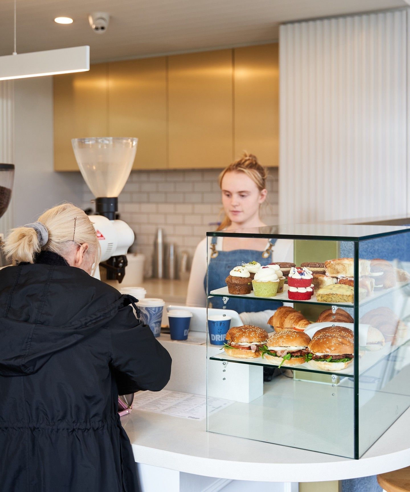 The counter at Drip Cafe, Cheltenham, mid-service