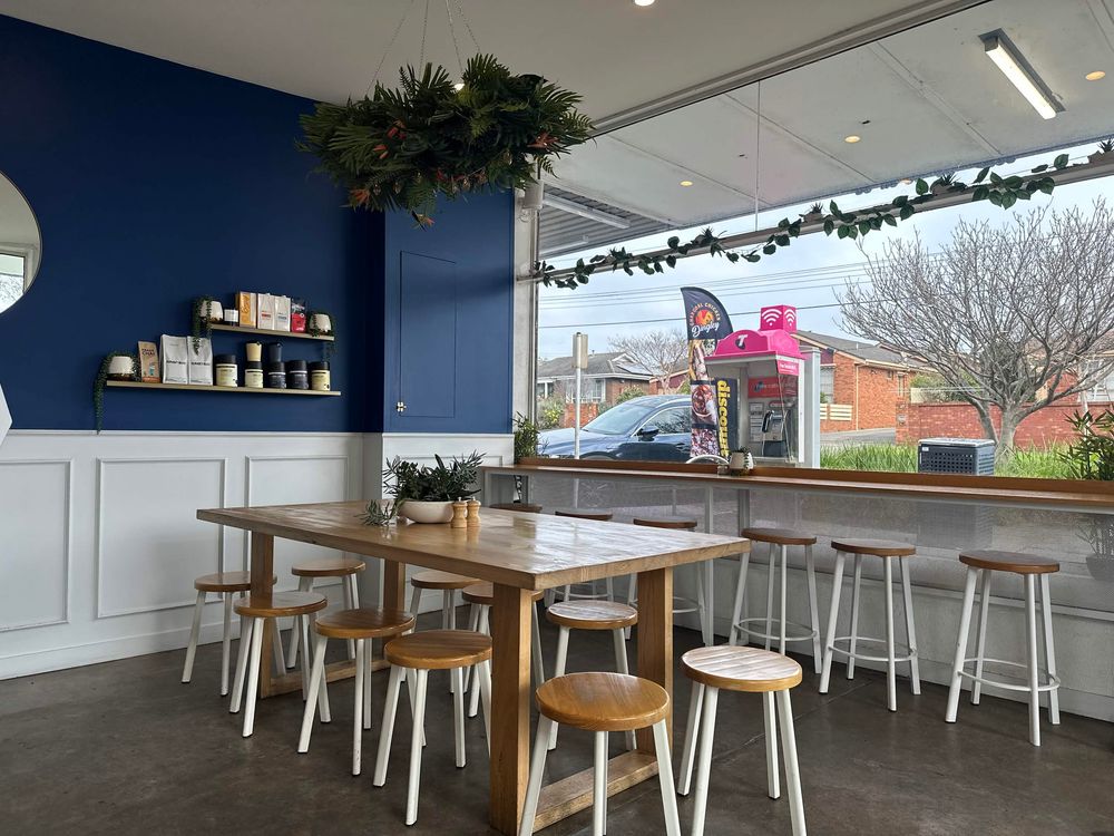 The communal table and stools at Drip's front window
